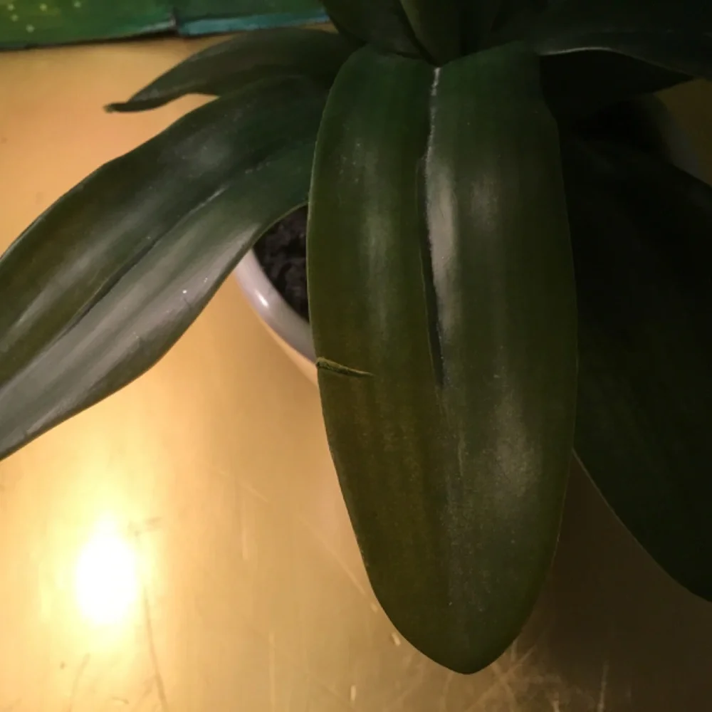 Ashland Red Floral faux potted plant with minor flaw.